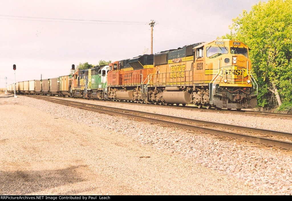 Coal empties ease west towards the yard and a crew change